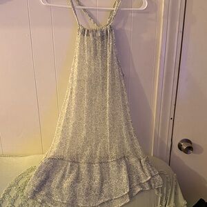 Elegant Green and White Sleeveless Blouse